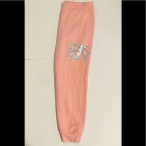 Pink DKNY joggers.